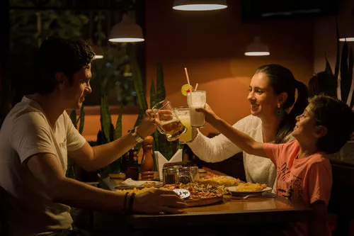 family cheersing with alcohol