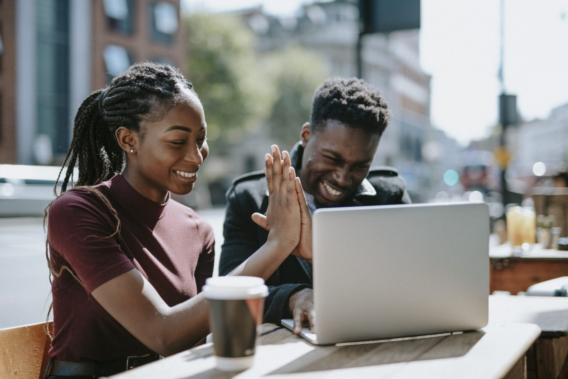 Friends supporting one another through addiction recovery treatment telehealth session