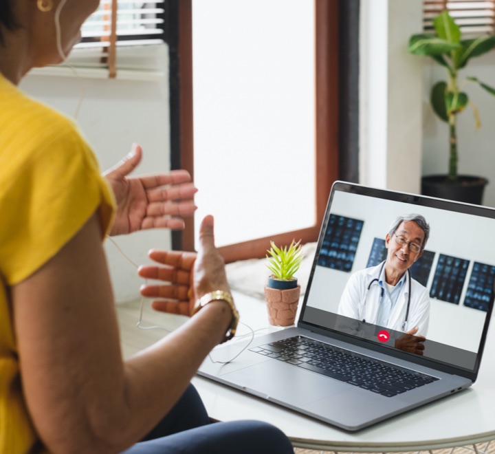 A woman joining a one-on-one telehealth session for addiction recovery treatment
