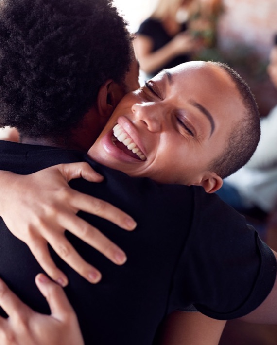 https://www.eleanorhealth.com/wp-content/uploads/2021/04/couple-greeting-each-other-with-hug-as-they-meet-i-E7BQAEA-Tall.jpg