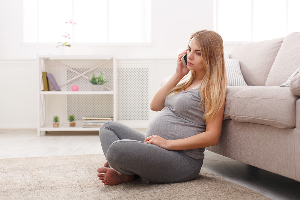 A pregnant woman calls her doctor to ask about detoxing while pregnant
