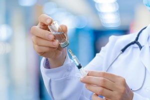 A doctor prepares a vivitrol shot