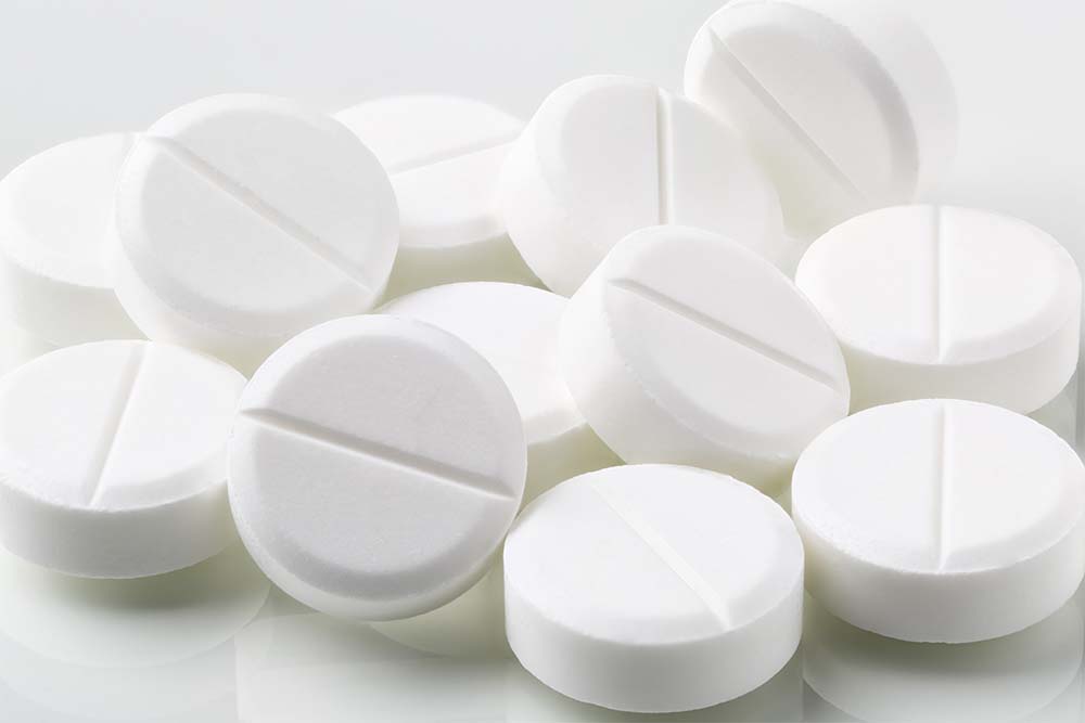 A pile of white antabuse pills