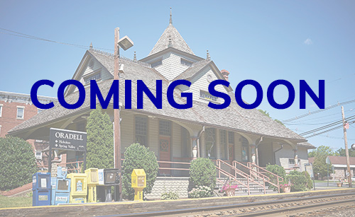 A view of the train station in Oradell, New Jersey with the words Coming Soon