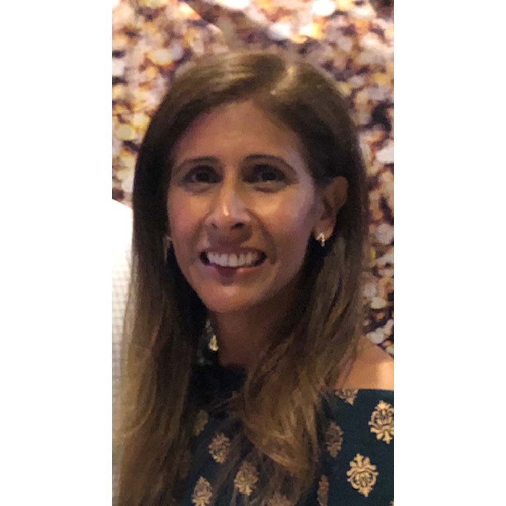 Manisha, a Psychiatrist for Eleanor Health's addiction treatment and mental health clinic in Fayetteville, North Carolina