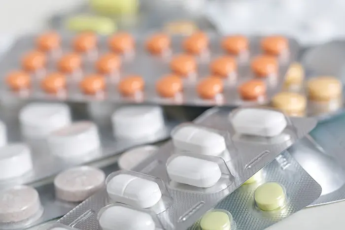 A pile of prescription drug tablets